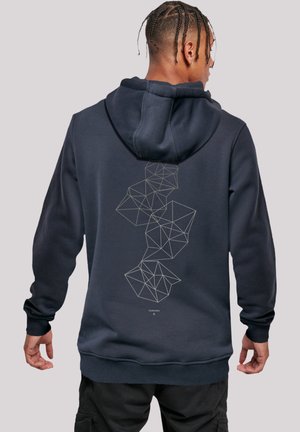 Navy blue hoodie with a geometric white line pattern on the back, featuring a relaxed fit, drawstring hood, and ribbed cuffs.