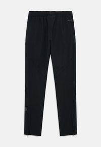 adidas Performance MANCHESTER UNITED COMPETITION TECH TRAVEL PANT UNISEX - Športne kratke hlače - black/purple rush
