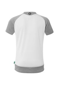 Camicia a maniche corte con corpo bianco, maniche raglan grigie e una decorazione a motivi sulla spalla sinistra. Tessuto morbido e liscio con orlo arrotondato.