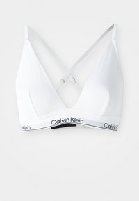 Bijela triangle bralette sa tankim, podesivim trakama na leđima, koja ima elastičnu traku s brendom 'Calvin Klein' u crnoj boji. Glatka tekstura.