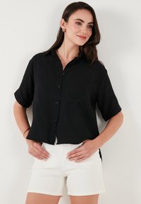 LELA Paitapusero - black