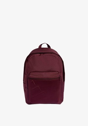 Bordowy plecak wykonany z wytrzymałej tkaniny, z przednią kieszenią na zamek oraz teksturowanym logo. Posiada górny uchwyt i wyściełane paski na ramiona.