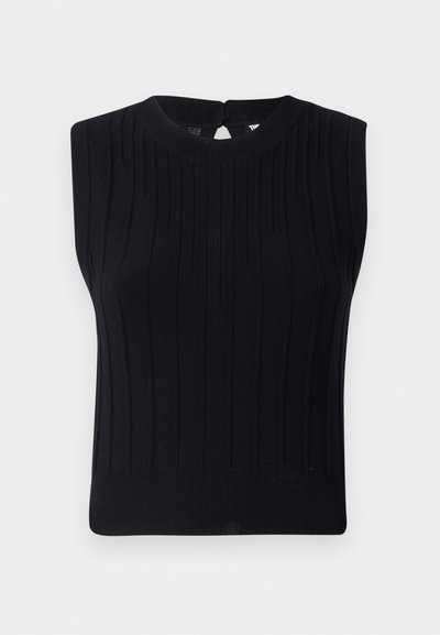 Top en maille sans manches noir avec texture côtelée, décolleté arrondi et petite ouverture en forme de clé dans le dos.
