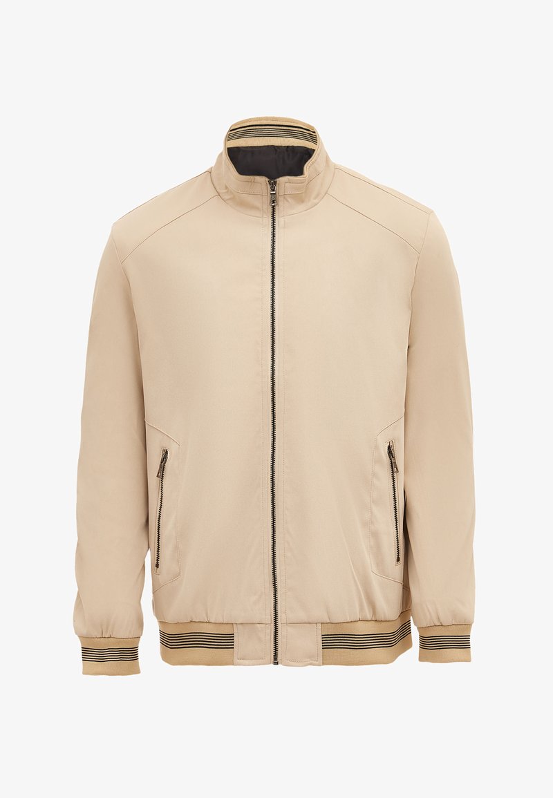 Beige Bomberjacke mit einem Reißverschluss vorne, seitlichen Reißverschluss-Taschen und gerippten Bündchen. Mit einem Stehkragen mit gestreiftem Detail.