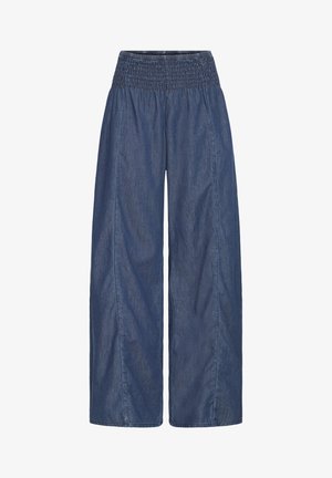 Wide-leg blue denim pants with elasticated, smocked waistband, no visible pockets or fastenings.