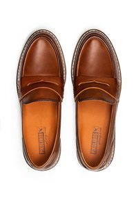 Brown leather loafers with a smooth texture, stitched detailing, and a rounded toe. Interior features orange lining and logo imprint.