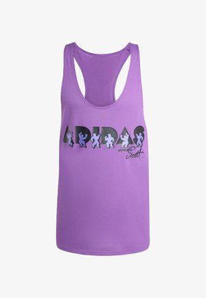 Lilla spagettitops, millel on risti seljaosa. Sellel on must ja helesinine graafiline "ADIDAS" logo stiliseeritud kujudega ja "JEREMY SCOTT".