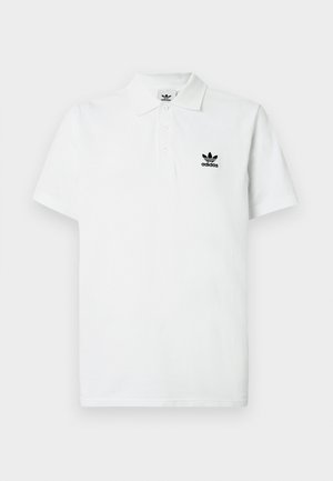 Witte katoenen polo met een klassieke kraag, een knoopsluiting met drie knopen en een zwart geborduurd Adidas-logo op de linkerborst. Korte mouwen.