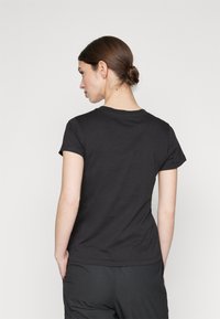 Calvin Klein Jeans SLIM TEE - T-shirt med print - black