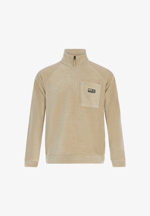 Beige fleece pullover med halvlukket front, raglanærmer og en brystlomme med logo. Blød tekstur og praktisk design.