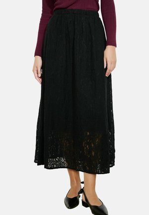 Black lace maxi skirt with an elastic waistband, featuring a floral pattern and a flowing silhouette, reaching ankle length.