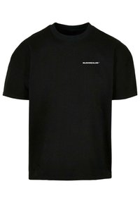 Sort bomulds-T-shirt med rund hals, korte ærmer og hvidt logo-tekst "MJGONZALES" foran i et moderne skrift.