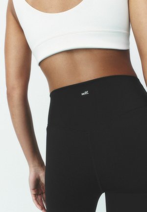 Self., REGULAR FIT - CAPRI SPORT LEGGINGS . - Leggings - black