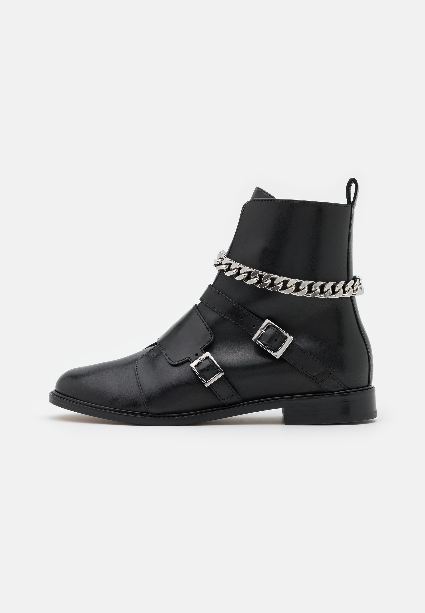 maje bottines boucles