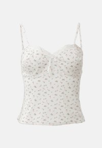 Camisole fleurie blanche avec des bretelles fines et ajustables, bordure en dentelle le long du décolleté, et un cordon de serrage au centre. Matière en coton doux.