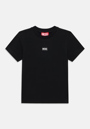Black short-sleeve crewneck t-shirt with small centered Diesel logo patch on chest and red Diesel label inside collar.