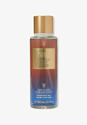 Victoria's Secret Vanilla Lace duftmistflaske på 250 ml med guldhætte og væske inde i, der skifter farve fra rød til blå.