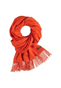 Orange tørklæde, lavet af blødt stof, med et loop-design og lange frynser langs den nederste kant samt et lille label.