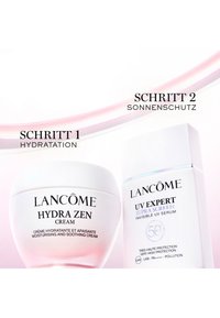 Lancome Hydra Zen Feuchtigkeitscreme und UV Expert SPF 50 Sonnenschutzserum, bezeichnet als Hydratationsschritt eins und Sonnenschutzschritt zwei.