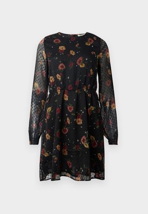 Black floral dress made of sheer fabric. Features long puff sleeves, a round neckline, an elastic waist, and a dotted pattern with various flowers.
