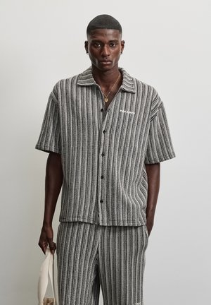 Pegador FORNO - Shirt - black/cream