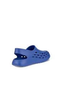 Blauwe, lichte rubberen klomp met een open achterkant, uitsparingen aan de zijkanten en golvende patronen op de bovenkant voor ventilatie. Duurzame zool.