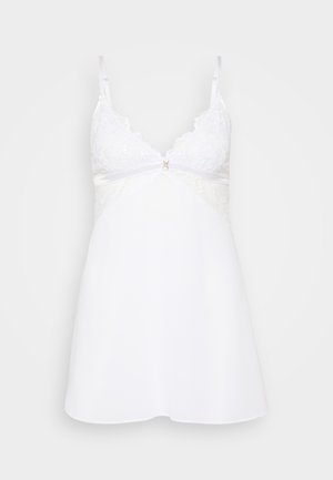 Witte nachthemd met kantaccenten, verstelbare bandjes en een V-hals. Heeft een centrale decoratieve sluiting en een vloeiende A-lijn vorm.