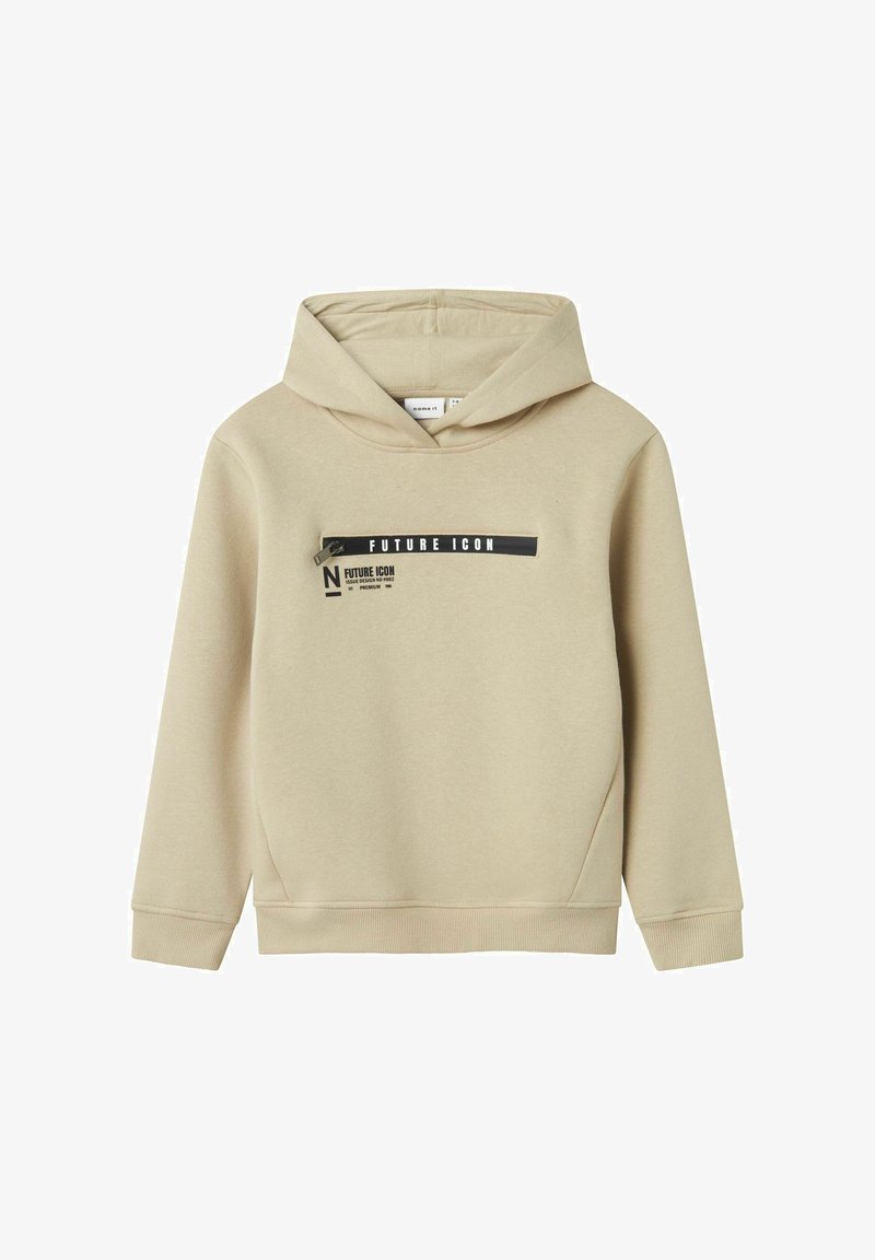 Beige hoodie gemaakt van zacht materiaal. Heeft een grafische print met de tekst "FUTURE ICON" in zwart over de voorkant en een buidelzak.