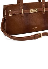 Brown faux fur and leather handbag with a structured shape. Gold-tone hardware accents, dual straps, and adjustable shoulder strap.