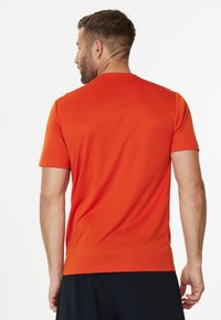 Endurance VERNON TEE - Sportovní tričko - pureed pumpkin