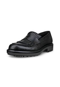 Mocassins en cuir noir avec un bout arrondi, détail en franges texturé sur le dessus, et une semelle en caoutchouc épaisse pour une meilleure adhérence.