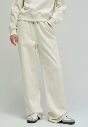 ANDY - Pantalones deportivos - beige