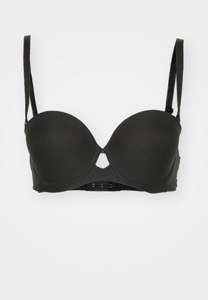 Must lõhuga must polsterdatud rinnahoidja, millel on traaditoed, sile tekstuur, reguleeritavad rihmad ja tagumine klambriga sulgur. Omab keskset lõhiku detaili.