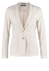 Vaaleanbeige bleiseri, jossa on räätälöity istuvuus, kaksi etutaskua, yksinkertainen nappisuljenta ja lovikaulus. Valmistettu sileästä kankaasta.