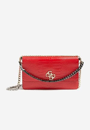 Red, faux-crocodile leather handbag with gold and black chain straps. Features a gold logo emblem and a sleek rectangular design.