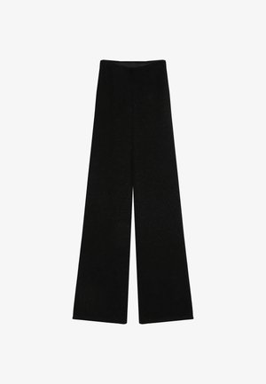 Pantalones de pierna ancha en negro, confeccionados con una tela texturizada, que cuentan con una cintura alta y un acabado suave, adecuados para diversas opciones de estilismo.