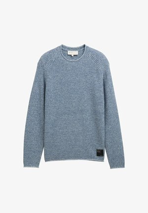 Sinine pullover-sweater, millel on tekstuuriga kudumine, ümar kaelus ja pikad varrukad. Alumisel vasakul küljel on must silt.