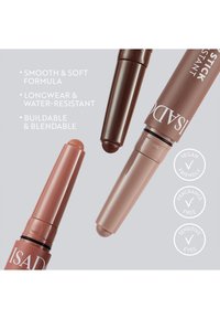 Three lipsticks with smooth, soft formula; one is dark brown, one is light peach, and one is light nude, all in twist-up tubes.