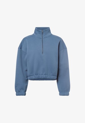 Utsnittet blå genser med høy krage, halv-lukking og samlet mansjetter, laget av myk, teksturert stoff.