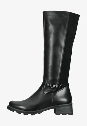 Bottes noires à hauteur de genou, alliant cuir lisse et daim, avec un talon épais et un détail de chaîne autour de la cheville.