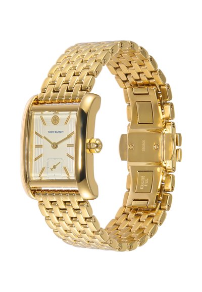 Gold-tone Tory Burch wristwatch with rectangular face, linked bracelet, date subdial, and branded crown, shown at a slight angle.