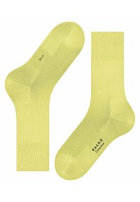 Gelbe Socken aus CimaWool, mit einer glatten Textur, geripptem oberen Rand und verstärktem Fersen- und Zehenbereich für zusätzliche Haltbarkeit.
