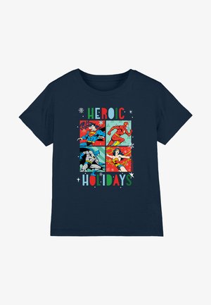 Navy cotton t-shirt with comic-style graphic featuring Superman, Flash, Batman, and Wonder Woman, text "HEROIC HOLIDAYS" in colorful letters.