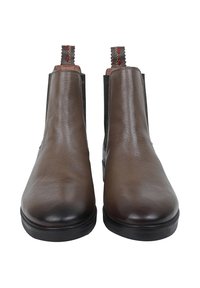 Brune læder Chelsea støvler med en tekstureret finish, elastiske sidepaneler og trækflapper. Afrundet tå og sort gummisål.