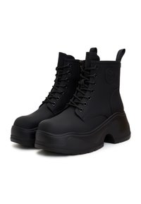 Cesare Gaspari Bottines à plateau - mottled black