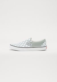 Kergesti jalga libisev sneaker, millel on heleda rohelise ja valge ruuduline muster, hall nahkaktsent ja valge kummist tallaga musta äärisega.