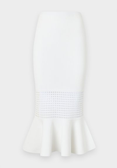 Fehér midi szoknya bordázott anyagból, amelynek alján hálós panel található, és a szoknya alja bővül. Sima textúra körkivágásokkal.