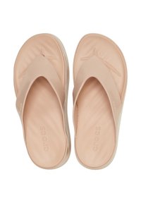 Helle rosa Flip-Flops aus glattem Gummi. Flaches Design mit konturiertem Fußbett und überkreuzten Riemen. Logo an der Seite angebracht.