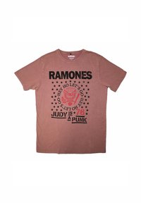 Brown cotton t-shirt featuring a black graphic print with text: "RAMONES," a red eagle, stars, and "JUDY IS A PUNK" in bold letters.