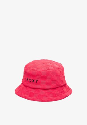 Ružový pletený klobúk typu bucket s textúrou v tvare šachovnice, na boku s čiernym logom "ROXY". Mäkký materiál a okrúhla, široká krempa.